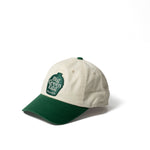 white ballcap with green bill
