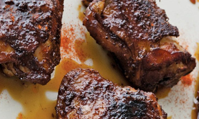 Bobby Flay’s Smoked Chicken Thighs with Sorghum-Chile Glaze