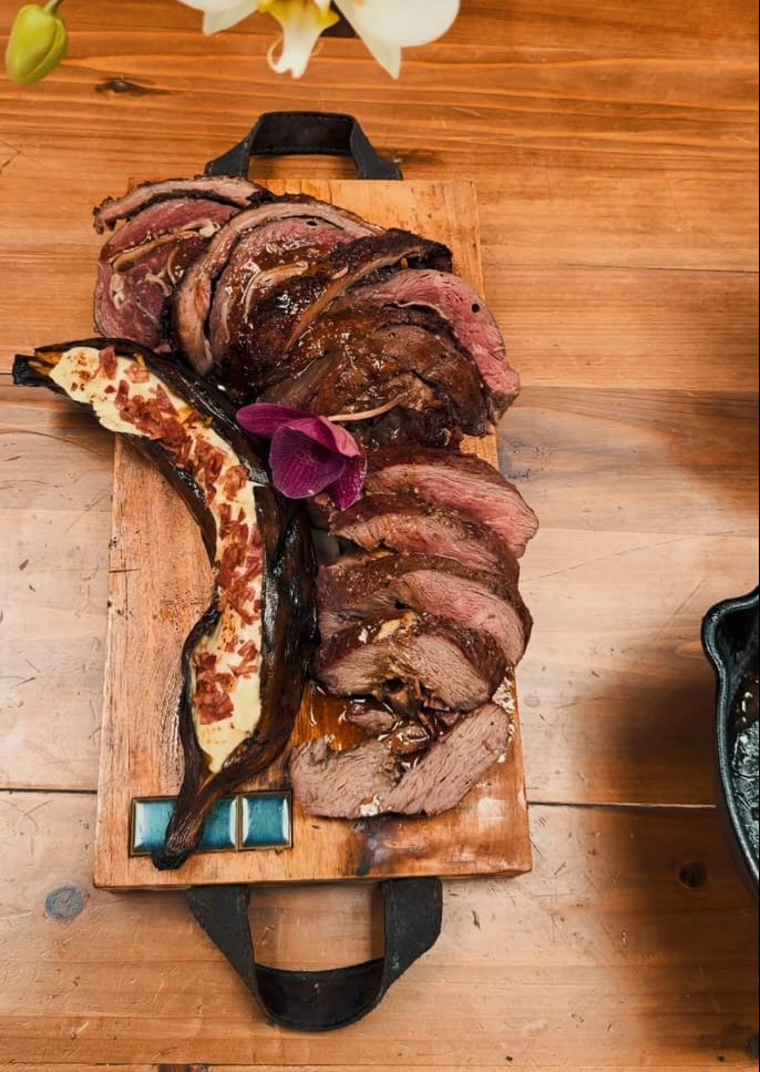 Rolled Picanha with Smoked Bacon, Caramelised Plantain & Melted Cheese