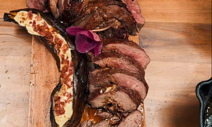 Rolled Picanha with Smoked Bacon, Caramelised Plantain & Melted Cheese
