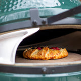 Green ceramic grill with a Galette inside