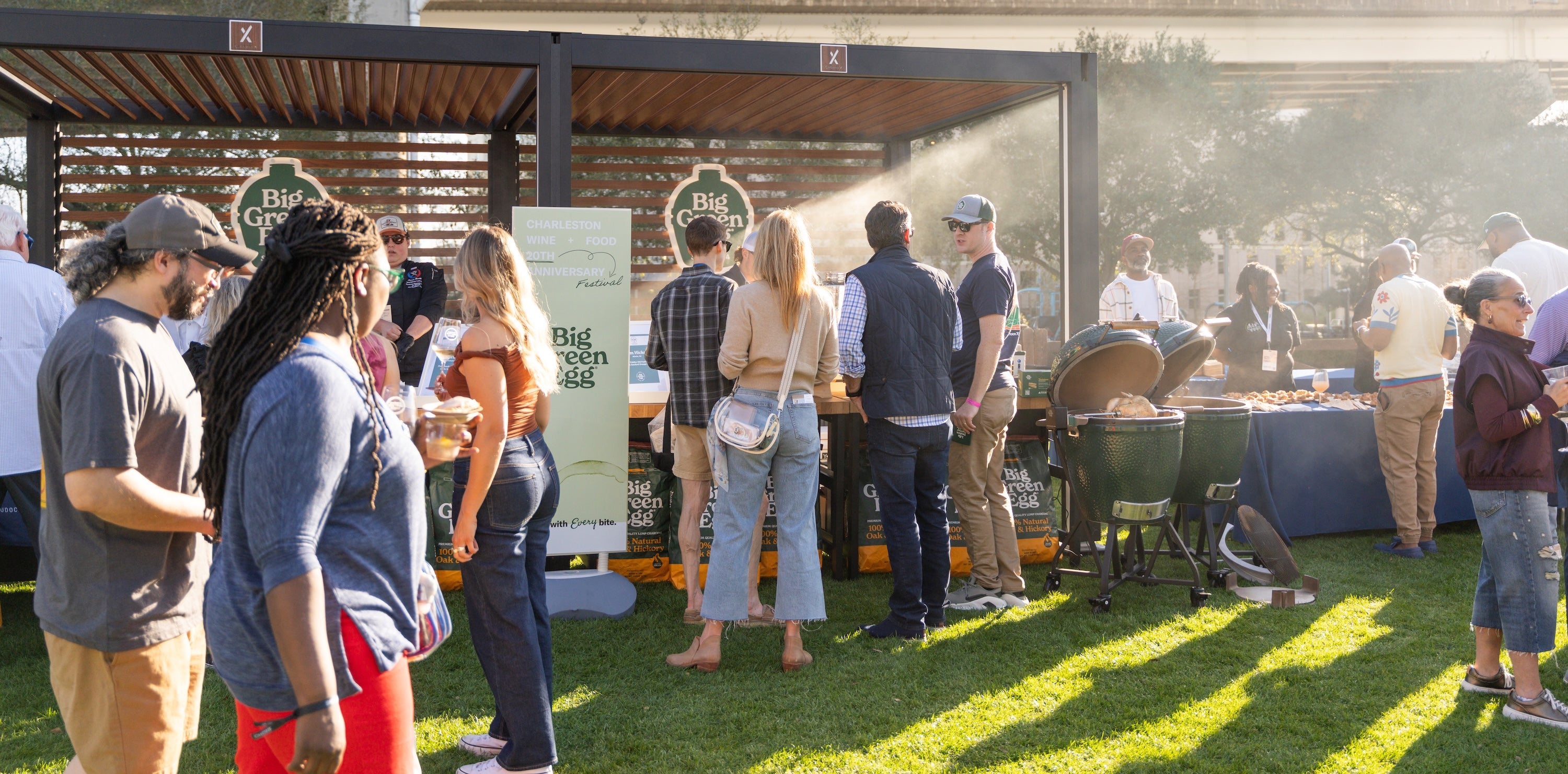 People gathered around a food truck at an outdoor event