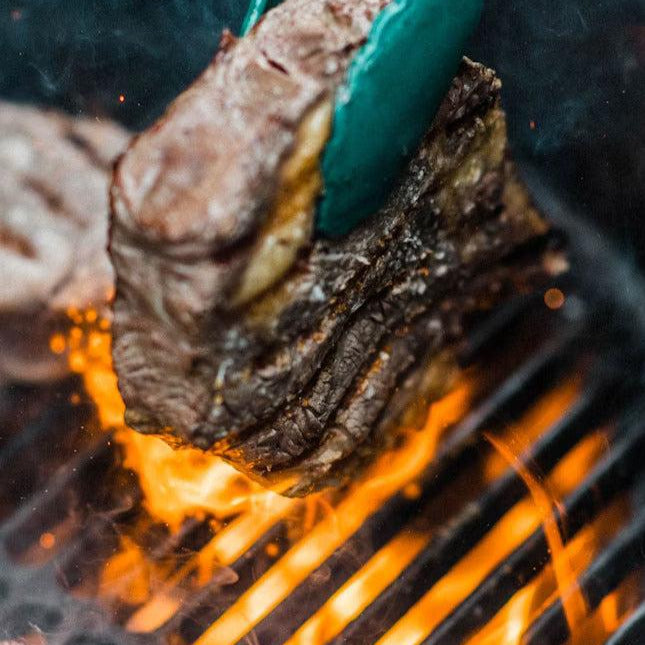 Grilling a Steak on an Egg