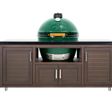 Green barbecue grill on a wooden cabinet with a white background