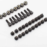 Set of black screws on a white background
