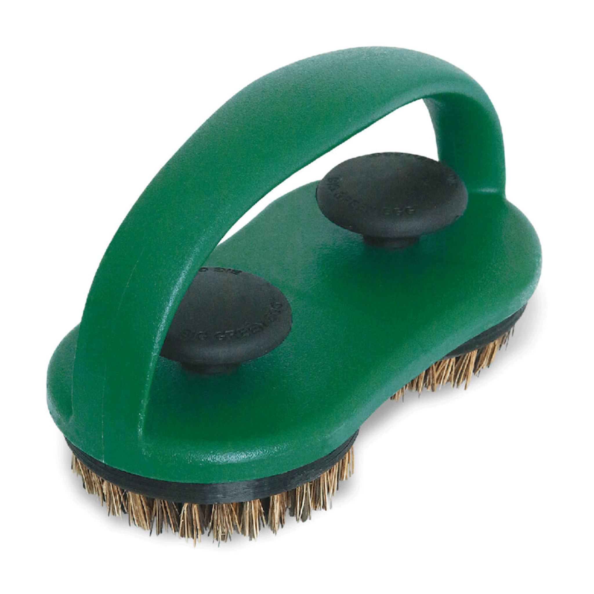 Green brush with black bristles on a white background