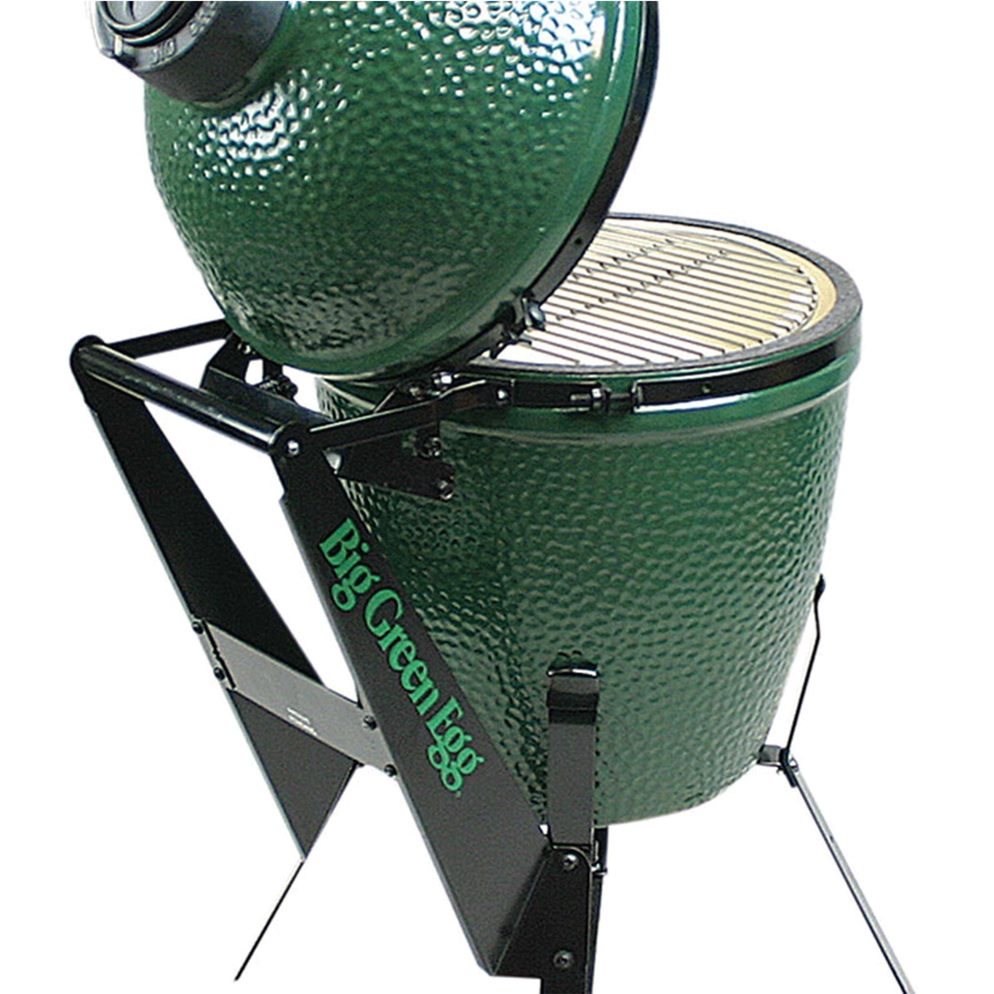 Green ceramic kamado grill with stand on a white background