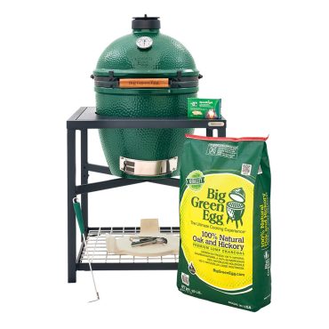 Large Big Green Egg in the modular nest stand and popular accessories: ash removal tool, convEGGtor, 20 pound bag of charcoal, cooking surface lifting tool,  new rEGGulator cap