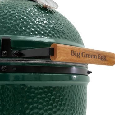view of Xlarge big green egg handle and temperature gauge