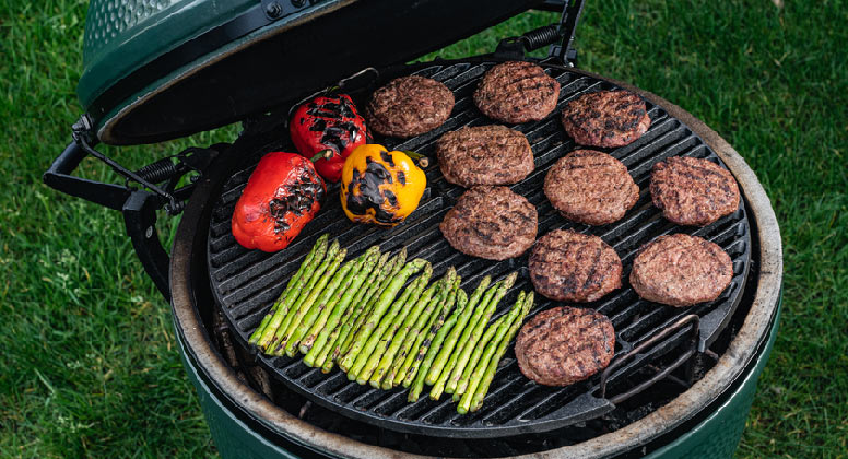 burgers and veggies grilling