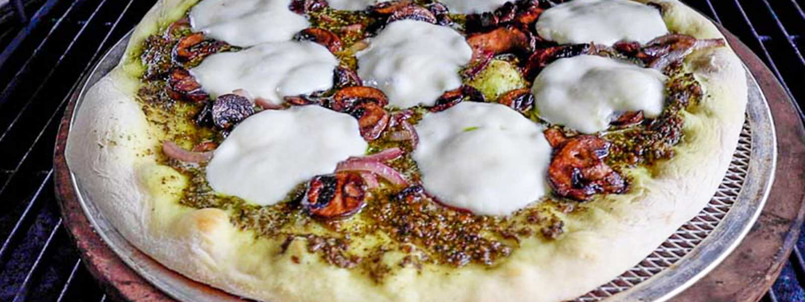 “Mrs-Buddha’s”-Mushroom-Onion-and-Pesto-Pizza.jpg